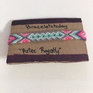 An Aztec styled bracelet made of cotton string.